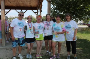 Team "Colorful Characters" poses for a photo-op following the awards ceremony at the 2012 Color Splash 5K