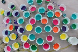 Hundreds of cups of paint await their splattered fate on an oversized canvas for one of the art pieces created along the 2012 5K route.